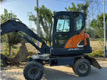 Gumikerekes kotró DOOSAN DX60W