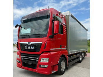Ponyvás teherautó MAN TGX 26.500