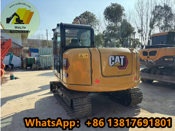 Minikotró CAT 307E Caterpillar 307E2: 3 kép. Minikotró CAT 307E Caterpillar 307E2: 3 kép.