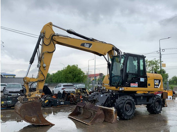 Gumikerekes kotró CATERPILLAR M313D