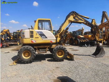 Minikotró Komatsu PW 95: 4 kép.