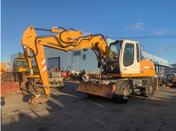 Gumikerekes kotró LIEBHERR A 314