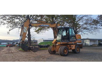 Gumikerekes kotró CASE