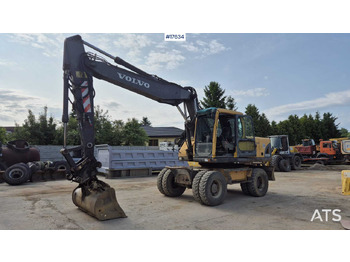 Gumikerekes kotró VOLVO EW180
