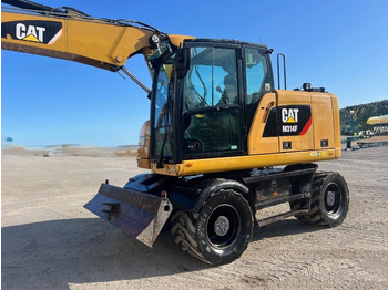 Gumikerekes kotró CATERPILLAR M314F