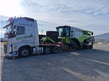 Kombájn a következők szállításához élelmiszer Claas Lexion 770: 5 kép.