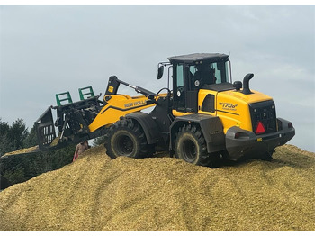 Gumikerekes homlokrakodó NEW HOLLAND