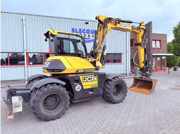 Gumikerekes kotró JCB Hydradig 110W: 5 kép.