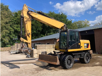 Gumikerekes kotró CATERPILLAR M316D
