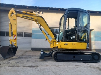 Minikotró Komatsu PC30MR-3: 4 kép.