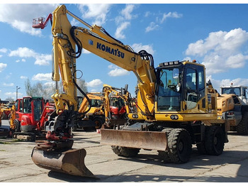 Gumikerekes kotró KOMATSU PW148-10
