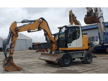 Gumikerekes kotró LIEBHERR A 910