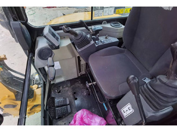 Minikotró Caterpillar 303.5E: 5 kép.