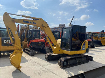 Minikotró KOMATSU PC56-7: 5 kép. Minikotró KOMATSU PC56-7: 5 kép.