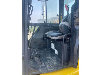 Minikotró Komatsu PC55MR: 5 kép.