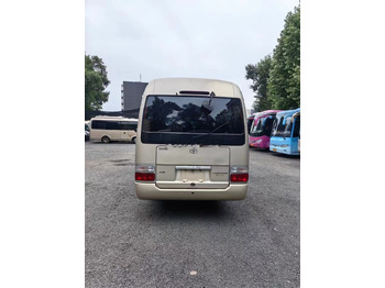 Távolsági busz Toyota Coaster: 4 kép.