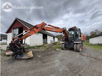 Gumikerekes kotró HITACHI ZX140W-3