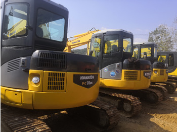 Minikotró KOMATSU PC78US: 5 kép.