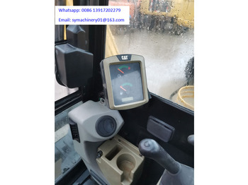 Minikotró Caterpillar 306E2: 5 kép.