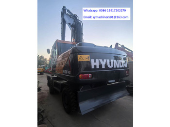 Gumikerekes kotró HYUNDAI R210