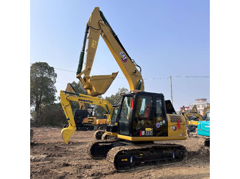 Gumikerekes kotró CATERPILLAR 312