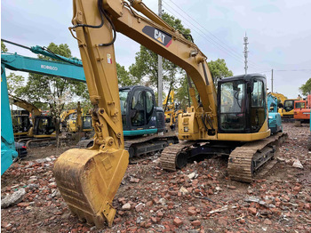 Gumikerekes kotró CATERPILLAR 313C Wheel Excavator Click for Discount: 2 kép. Gumikerekes kotró CATERPILLAR 313C Wheel Excavator Click for Discount: 2 kép.