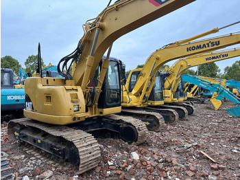 Gumikerekes kotró CATERPILLAR 313C Wheel Excavator Click for Discount: 3 kép. Gumikerekes kotró CATERPILLAR 313C Wheel Excavator Click for Discount: 3 kép.