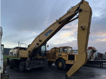 Hulladék kotró CATERPILLAR