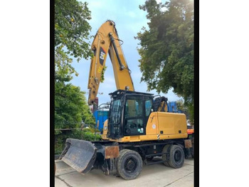 Hulladék kotró CATERPILLAR MH3022