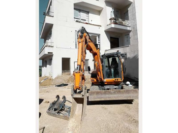 Gumikerekes kotró Mecalac 9MWR: 5 kép.