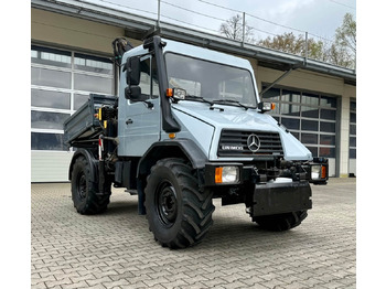 Billenőplatós teherautó UNIMOG