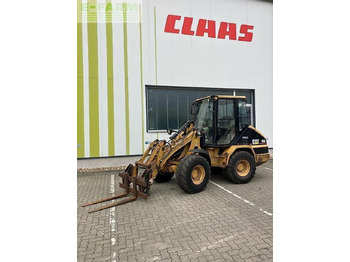 Minikotró CATERPILLAR 906