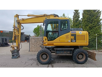 Gumikerekes kotró KOMATSU PW140