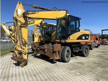 Gumikerekes kotró CATERPILLAR M315D