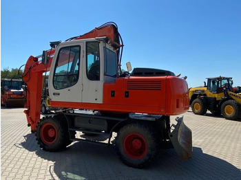 Gumikerekes kotró LIEBHERR A 900