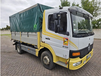 Ponyvás teherautó Mercedes-Benz Atego 918: 3 kép. Ponyvás teherautó Mercedes-Benz Atego 918: 3 kép.