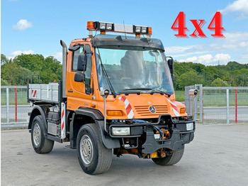 Billenőplatós teherautó UNIMOG