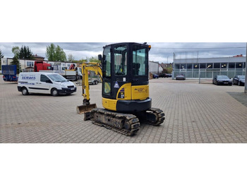 Minikotró Komatsu PC26MR-3: 3 kép.
