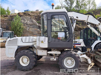 Gumikerekes kotró MECALAC