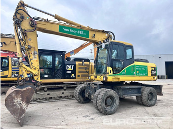 Gumikerekes kotró KOMATSU