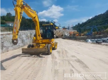 Gumikerekes kotró KOMATSU