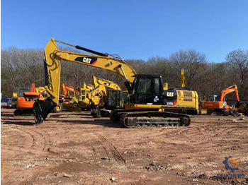 Kotrógép CAT 325D: 4 kép.