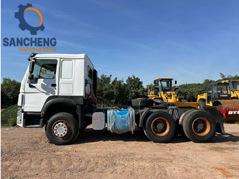 Nyergesvontató SINOTRUK HOWO Truck Head 371: 3 kép. Nyergesvontató SINOTRUK HOWO Truck Head 371: 3 kép.