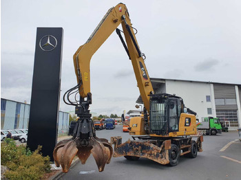 Gumikerekes kotró CATERPILLAR MH3024