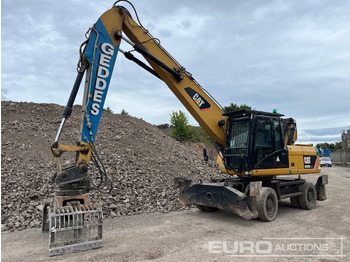 Gumikerekes kotró CATERPILLAR M318D