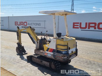Minikotró Yanmar B12-1: 3 kép.