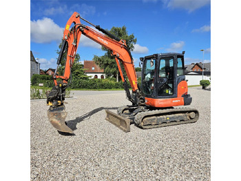 Minikotró Kubota KX057-4: 3 kép. Minikotró Kubota KX057-4: 3 kép.