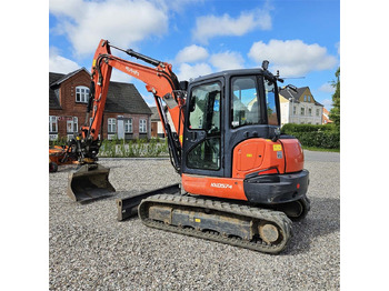 Minikotró Kubota KX057-4: 2 kép. Minikotró Kubota KX057-4: 2 kép.