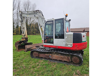 Lánctalpas kotró Takeuchi TB1140: 3 kép.