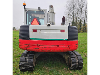 Lánctalpas kotró Takeuchi TB1140: 4 kép.